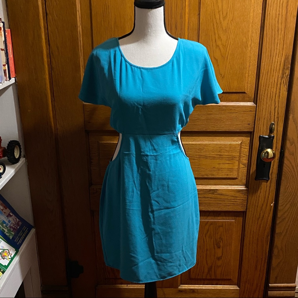 Light blue dress with cutouts.